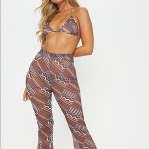 3 piece set. Top bottom and pants incuded